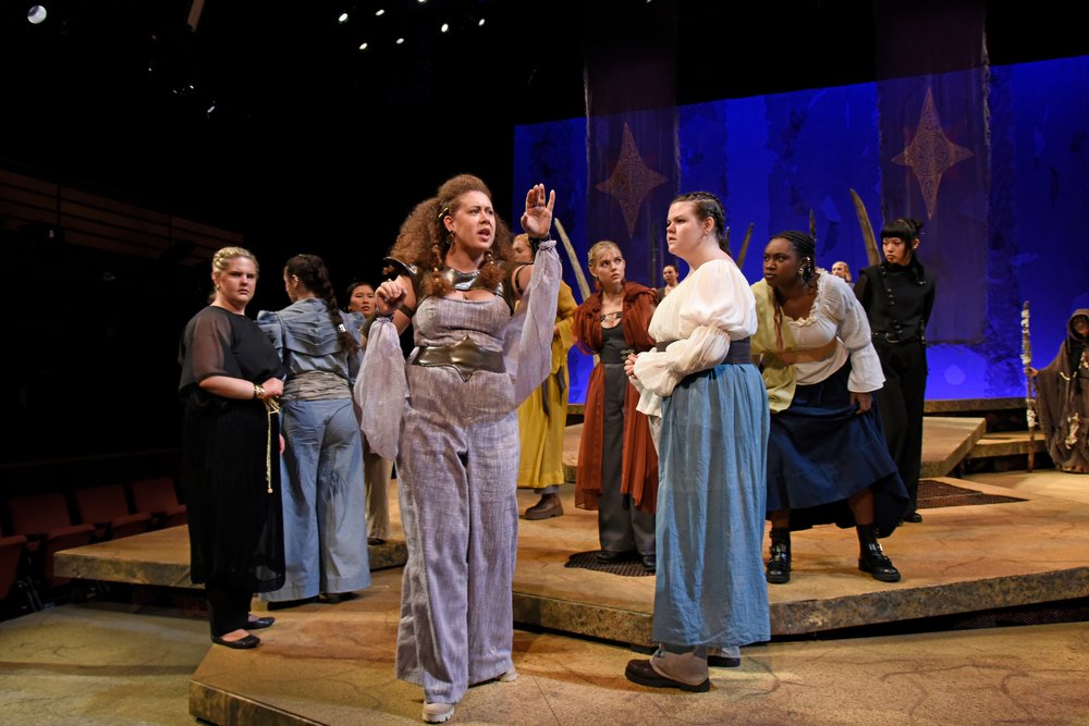 Caesar explains her plans to the townsfolk