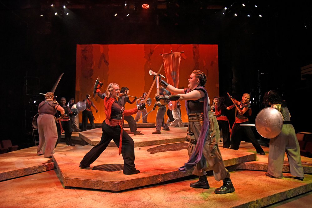Warriors fight each other with weapons and shields