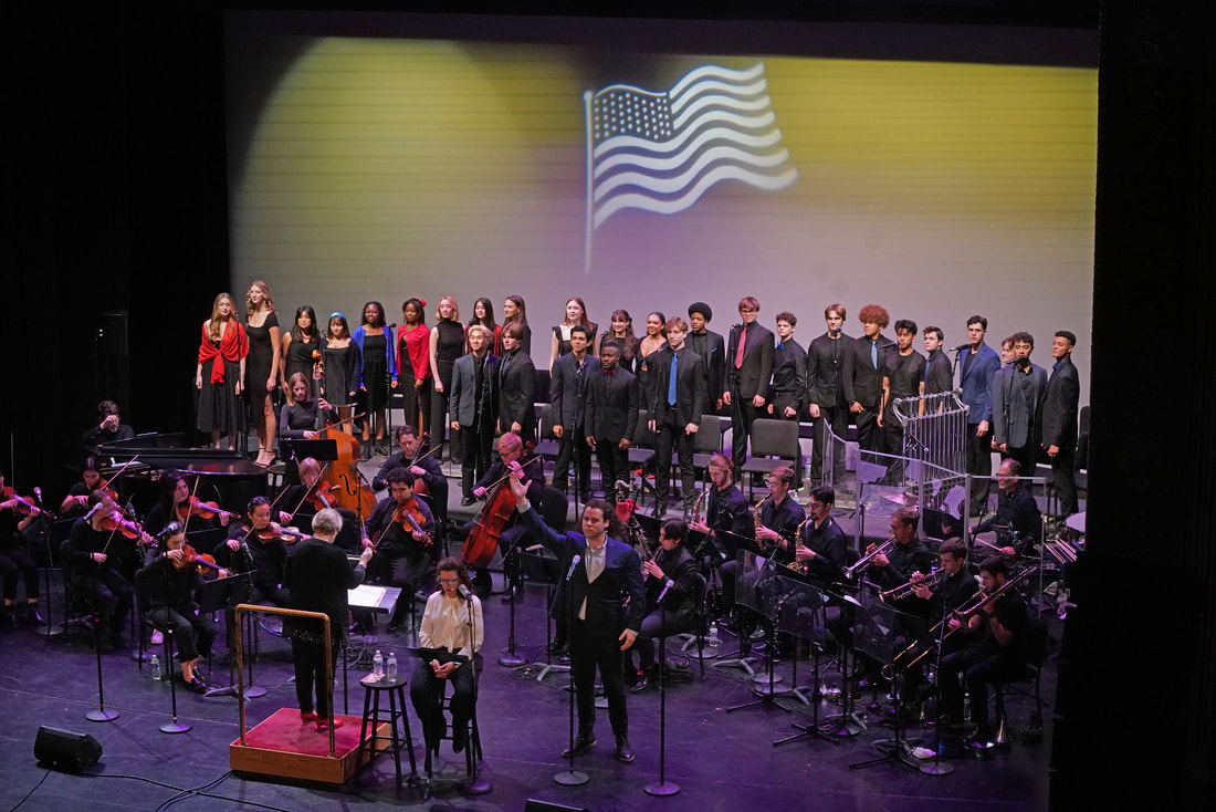 Wide view of full orchestra and chorus