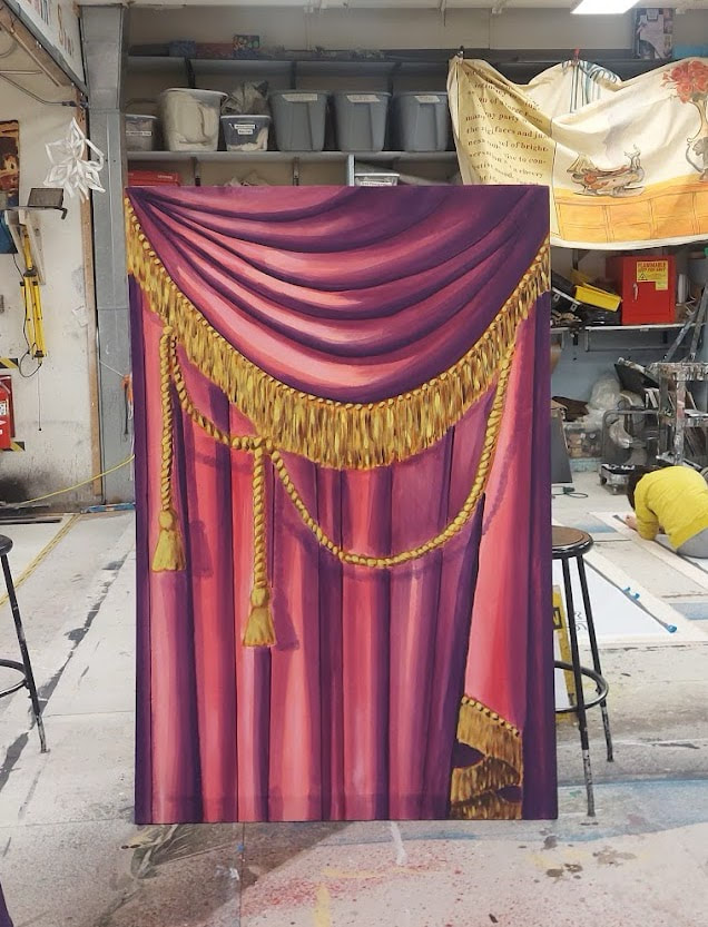 painted image of a curtain with tassles